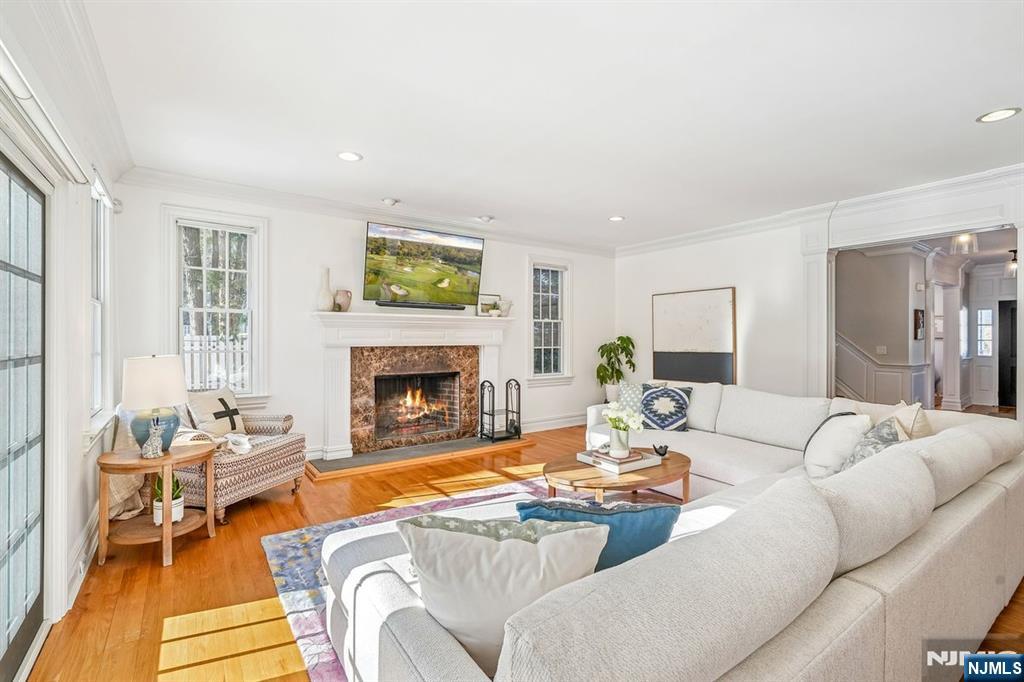 9 Mt Vernon Road Montclair, NJ 07043 - Photo 16 of 46 a living room with furniture fireplace and a table