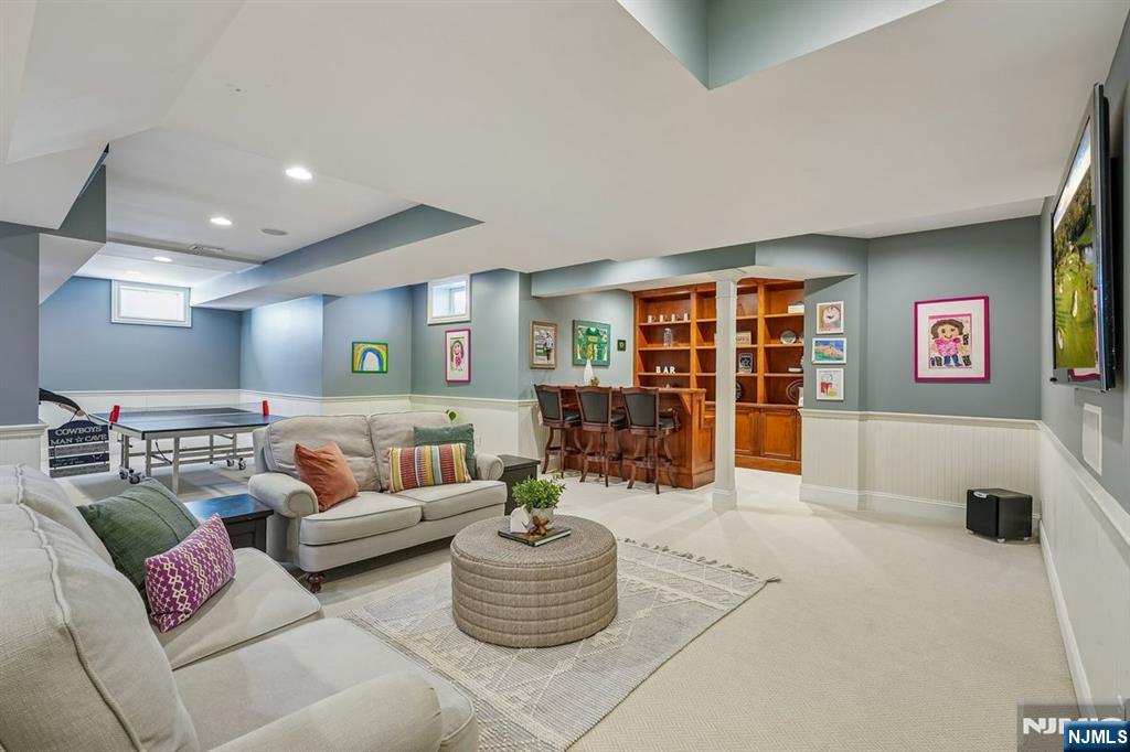 9 Mt Vernon Road Montclair, NJ 07043 - Photo 31 of 46 a living room with furniture and a table
