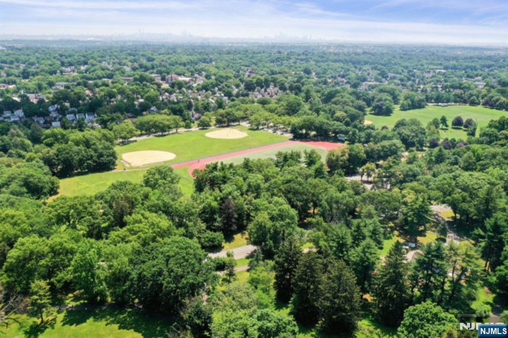 9 Mt Vernon Road Montclair, NJ 07043 - Photo 42 of 46 a view of a city with lush green forest