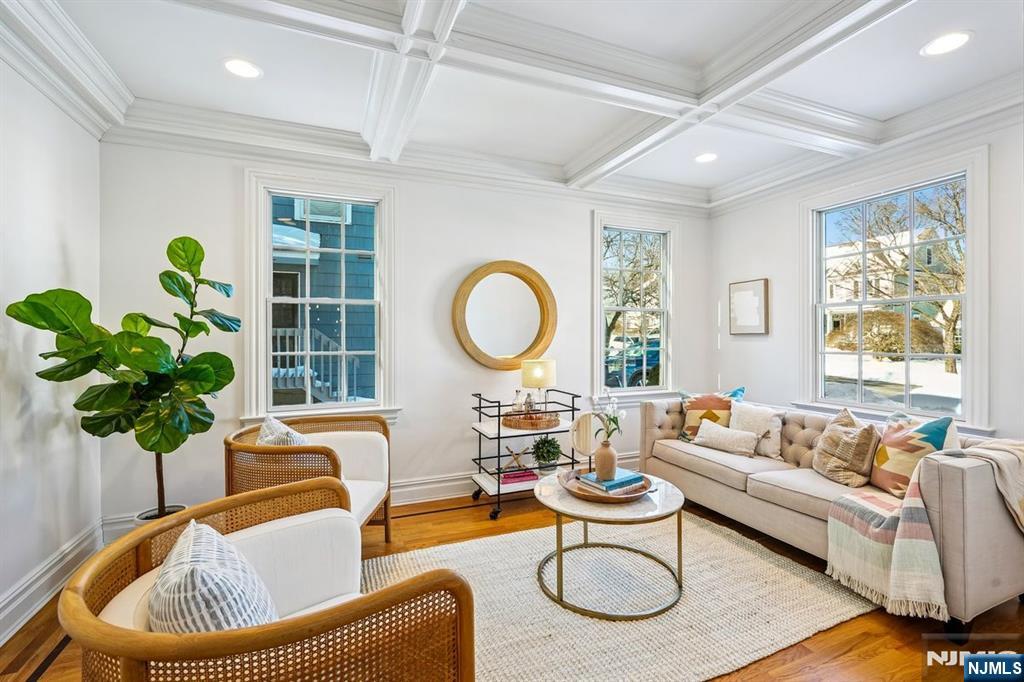 9 Mt Vernon Road Montclair, NJ 07043 - Photo 9 of 46 a living room with furniture potted plant and a large mirror