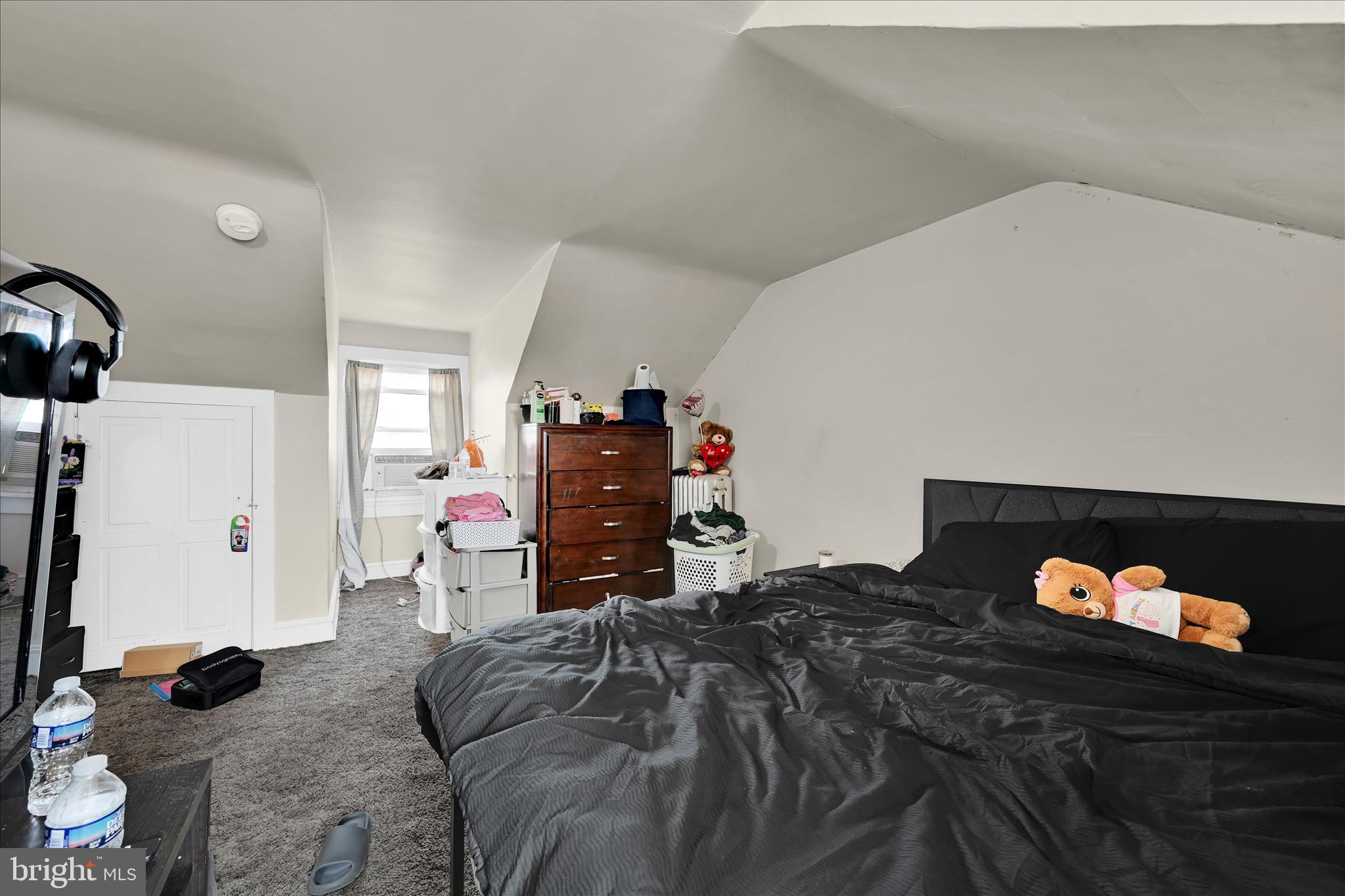 942 Pike Street Reading, PA 19604 - Photo 26 of 27 a bed room with a bed and a television