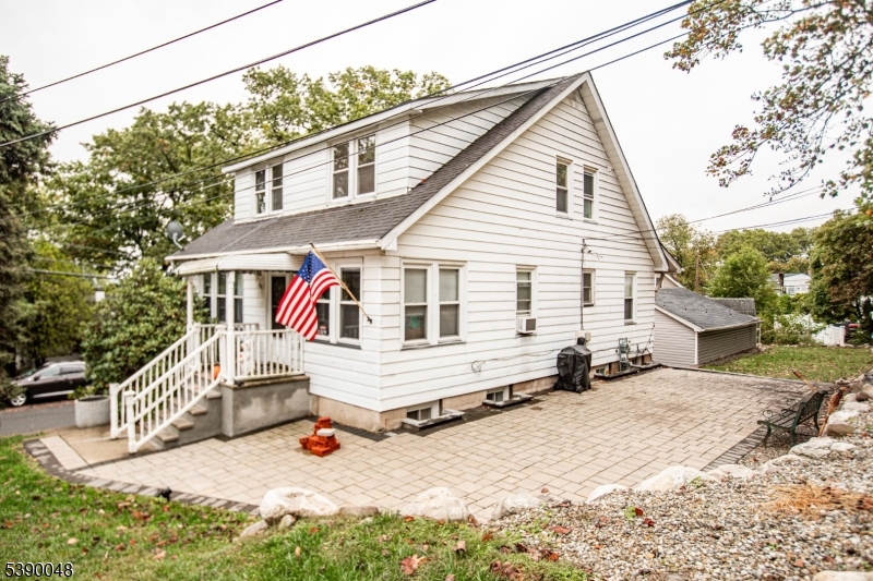 20 Summit Avenue, Unit 2 Hawthorne, NJ 07506 - Photo 1 of 24 a view of a house with snow on the road