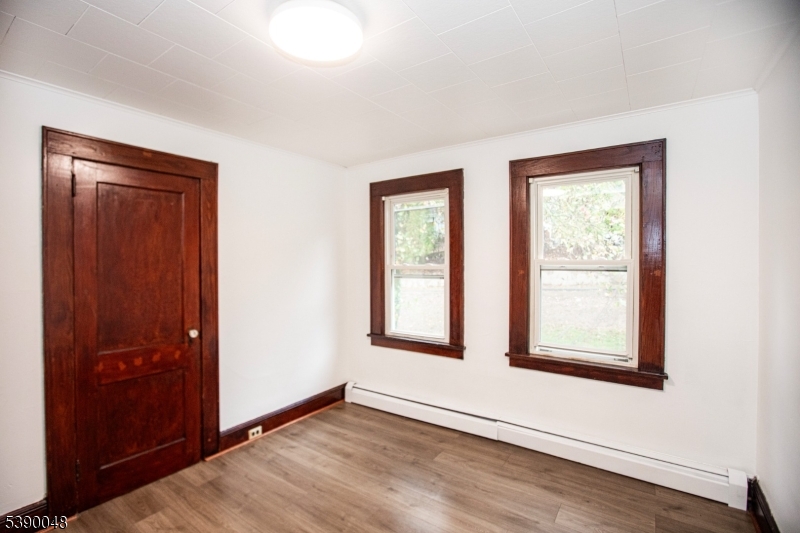 20 Summit Avenue, Unit 2 Hawthorne, NJ 07506 - Photo 15 of 24 an empty room with windows and closet