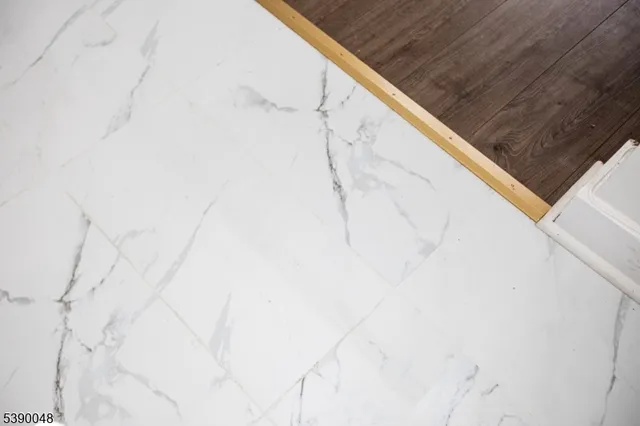 a view of balcony with white wall