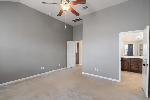 an empty room with a bathroom