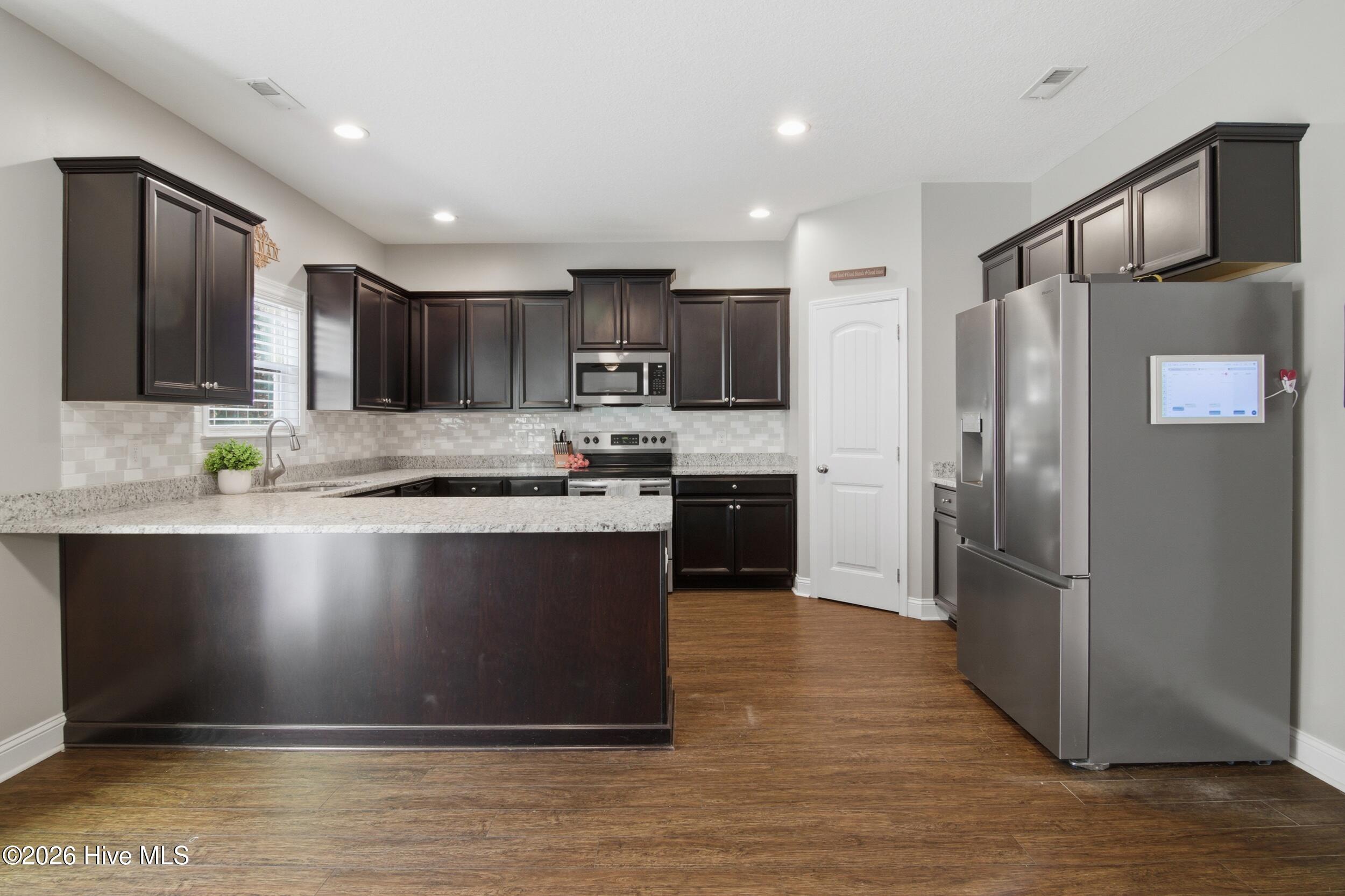 111 Lumis Court Hampstead, NC 28443 - Photo 23 of 68 29_kitchen 2