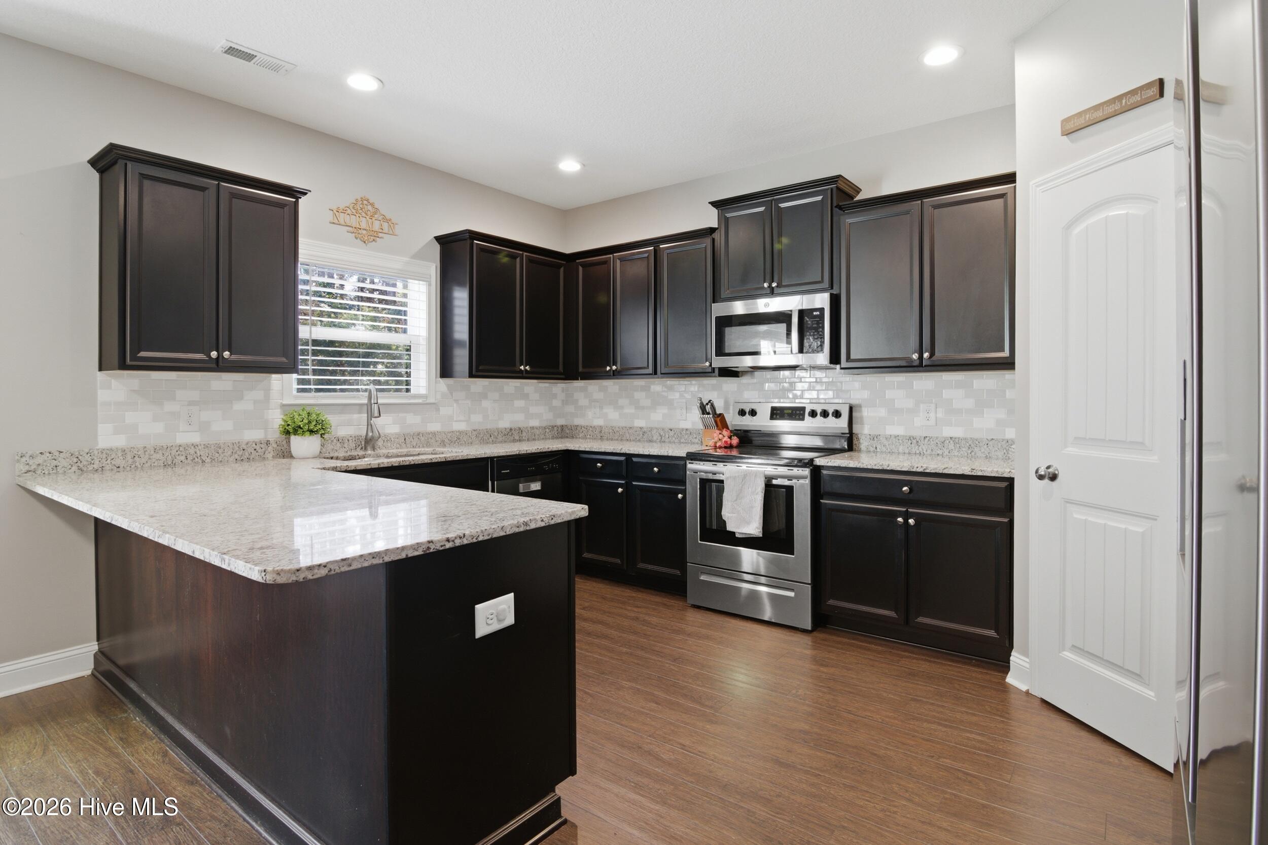 111 Lumis Court Hampstead, NC 28443 - Photo 25 of 68 30_kitchen 3