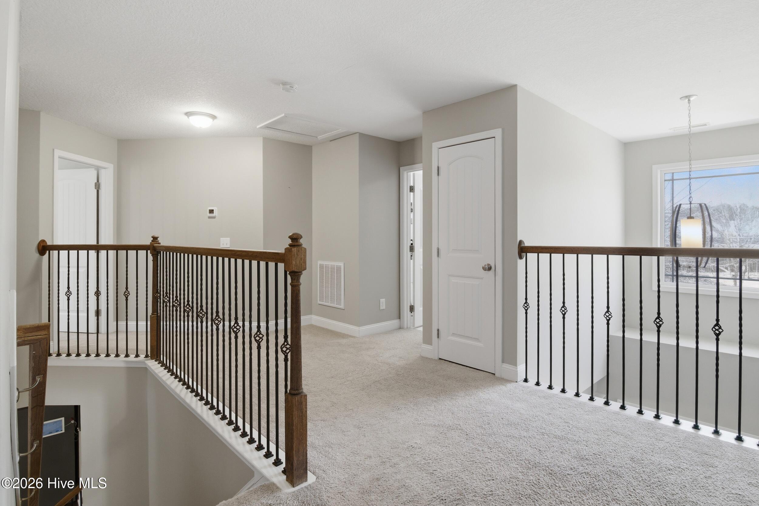 111 Lumis Court Hampstead, NC 28443 - Photo 29 of 68 37_top of staircase