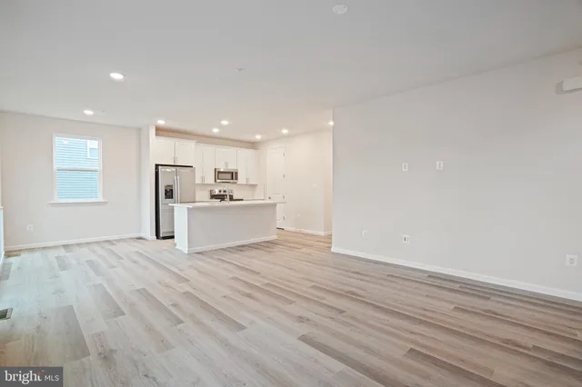 a view of kitchen with wooden floor