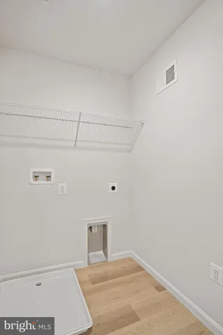 a view of a room with an empty space