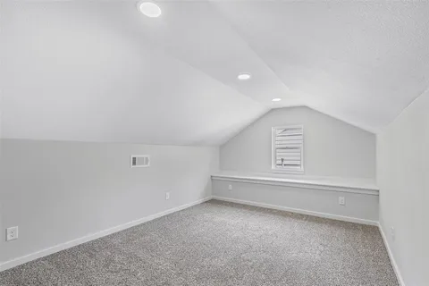 a view of hallway with closet