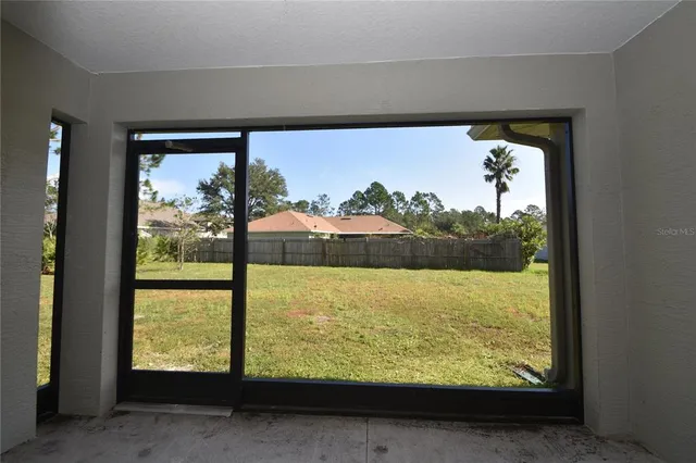 a view of a room with an outdoor view