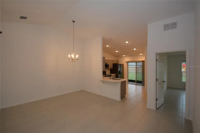 a view of a kitchen with a sink