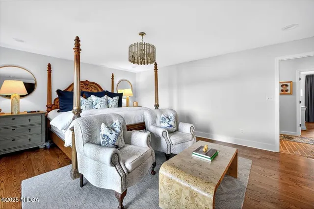 a kitchen with stainless steel appliances granite countertop a stove a sink dishwasher and cabinets with wooden floor