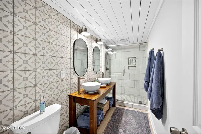 a view of a chairs and table on the wooden floor