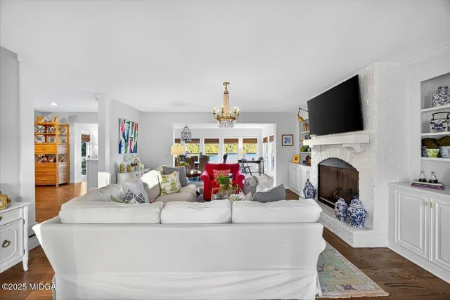 a bedroom with bed and window