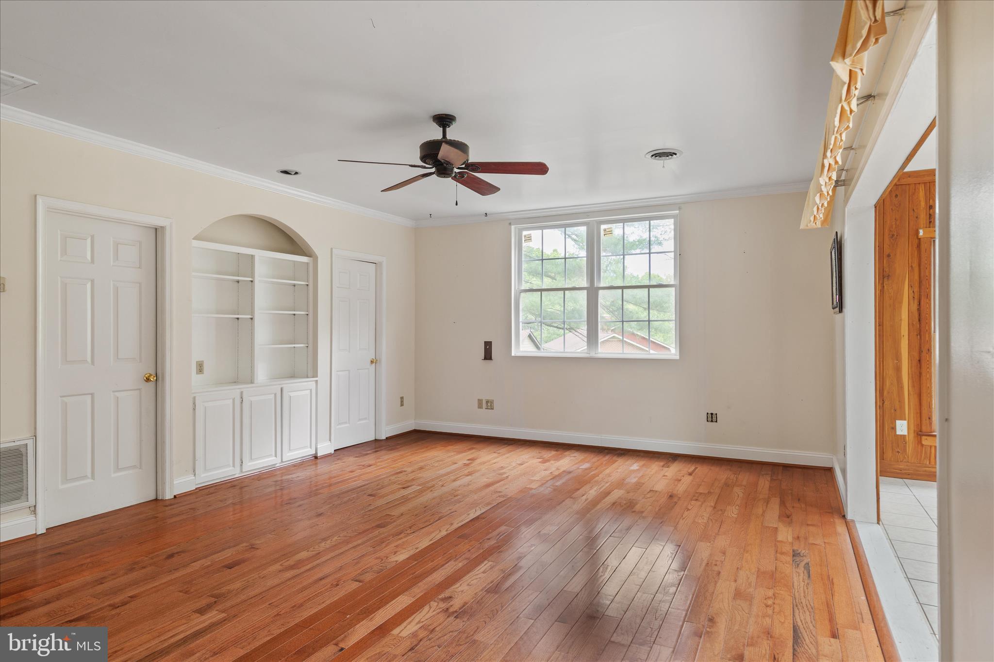 263 Bowling Green Road Front Royal, VA 22630 - Photo 26 of 75 a view of empty room with wooden floor and fan