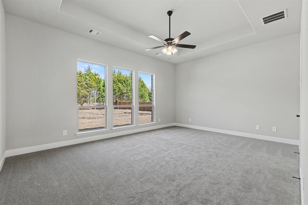 7041 Champion Road Midlothian, TX 76065 - Photo 12 of 30 a view of an empty room with a window