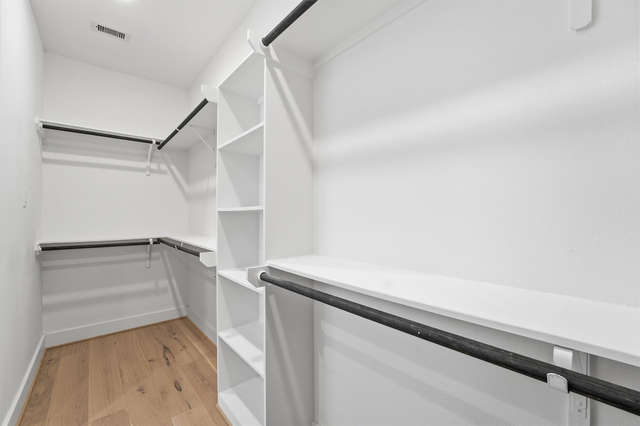 5004 Darling Street Houston, TX 77007 - Photo 27 of 41 Spacious walk-in closet offering ample storage and organization.