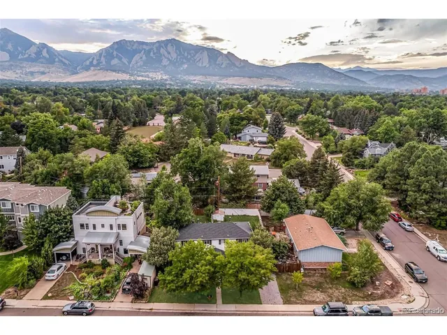 an aerial view of a house with a garden