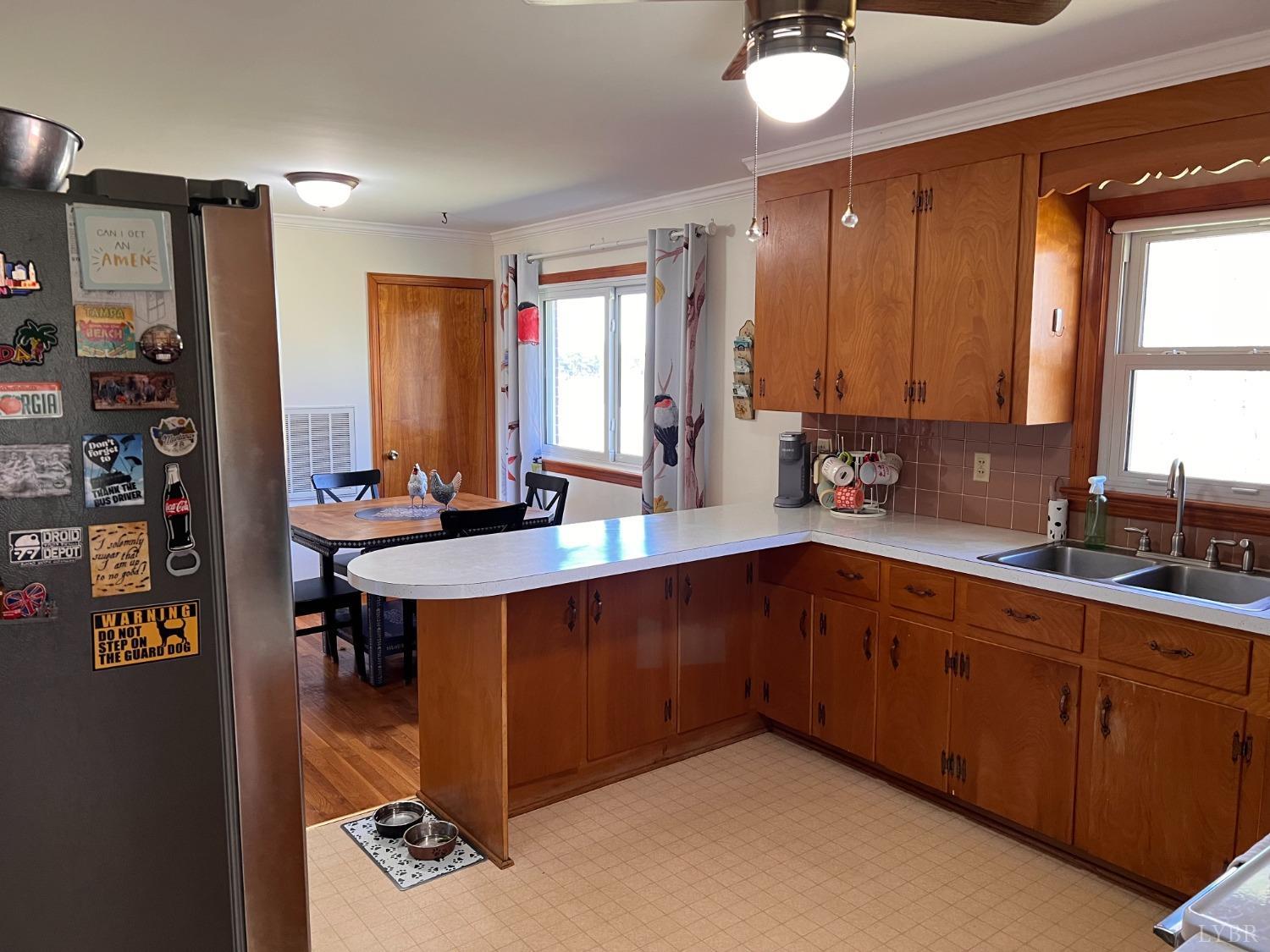 1930 Homeplace Road Rustburg, VA 24588 - Photo 24 of 88 a kitchen with stainless steel appliances sink cabinets and window