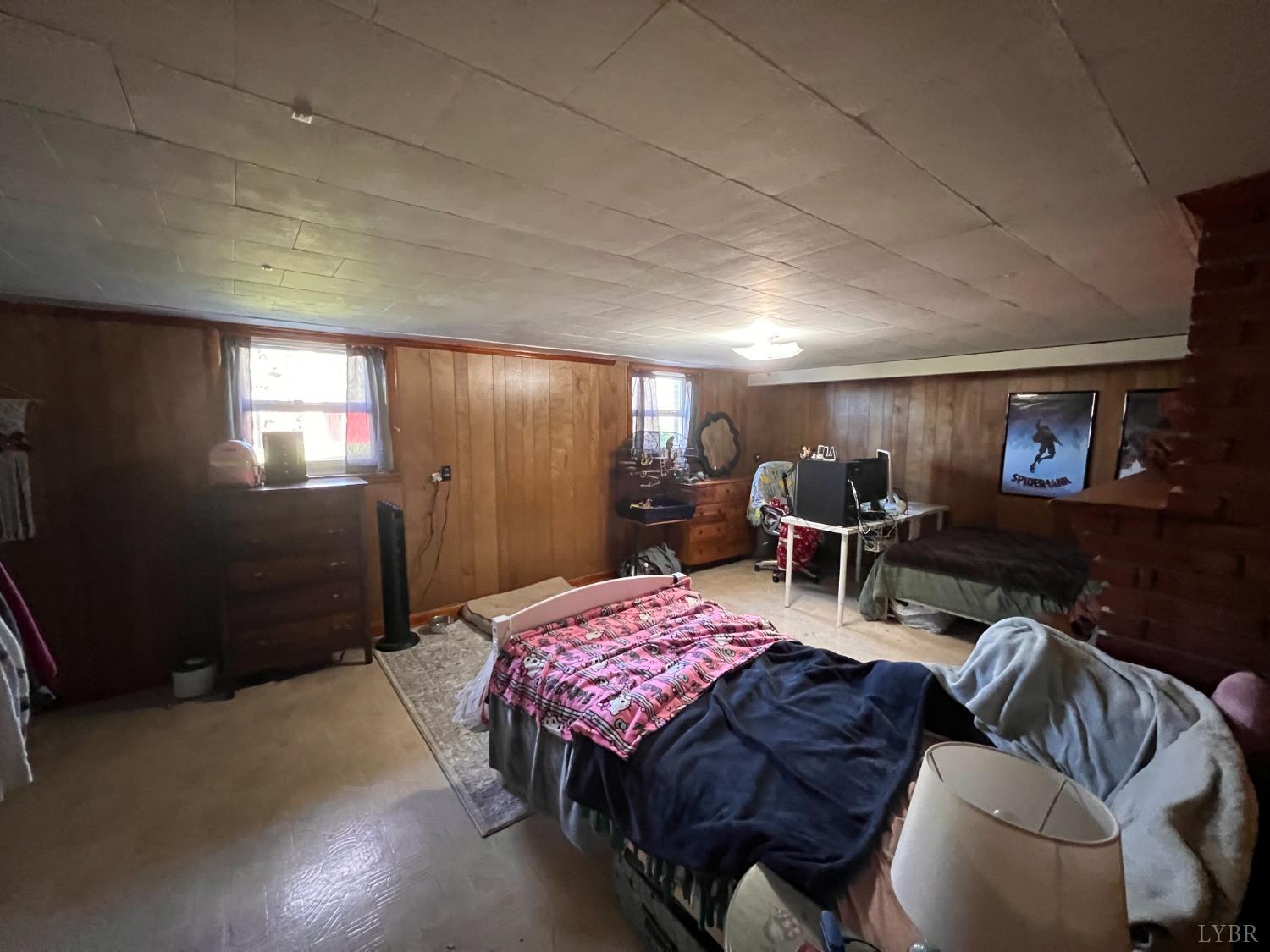 1930 Homeplace Road Rustburg, VA 24588 - Photo 46 of 88 a living room with furniture and a flat screen tv