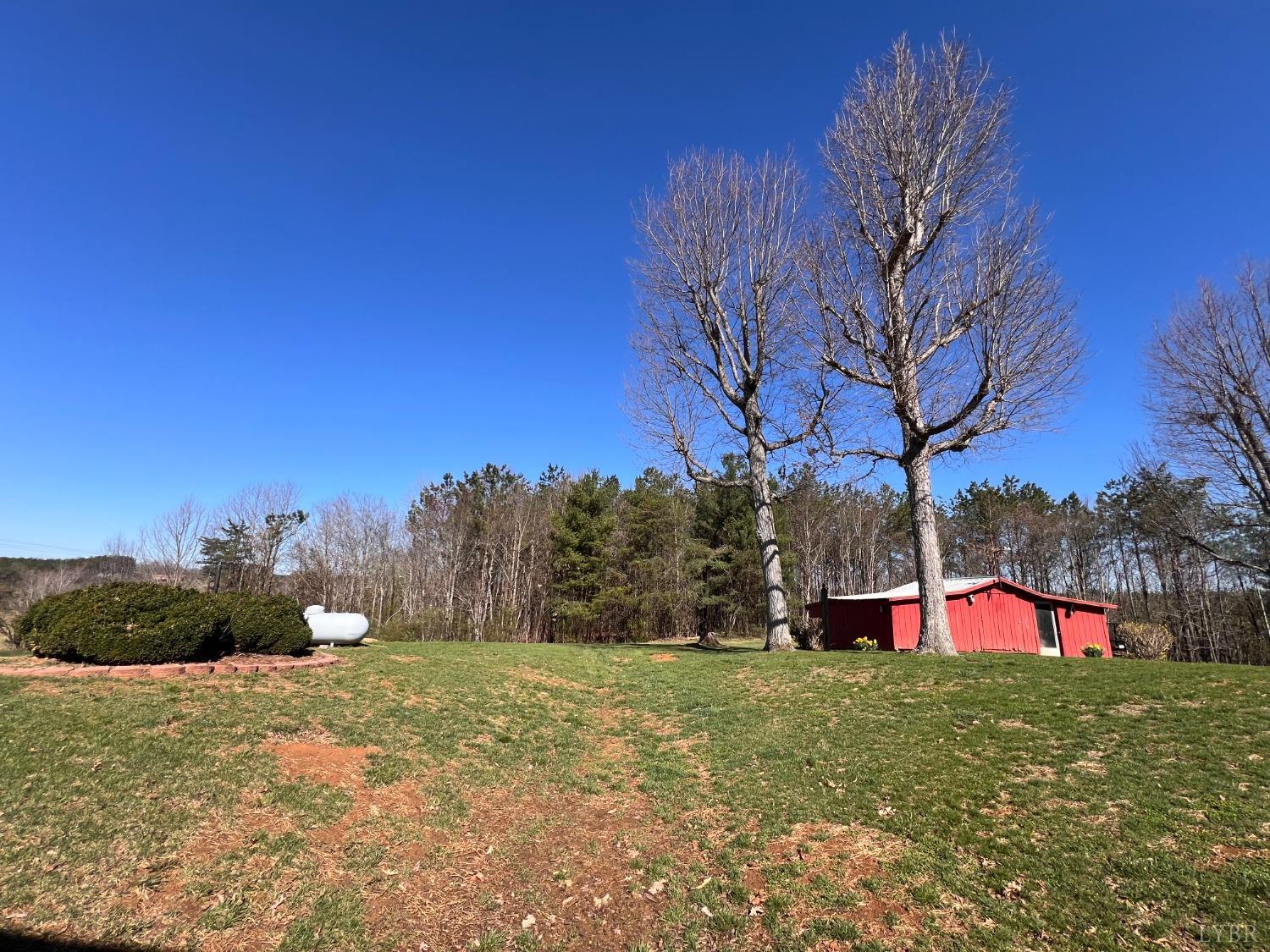 1930 Homeplace Road Rustburg, VA 24588 - Photo 61 of 88 a view of outdoor space with trees all around