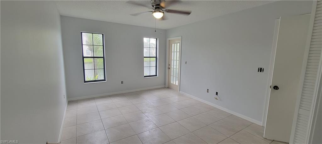 5233 Treetops Drive, Unit Y102 Naples, FL 34113 - Photo 8 of 9 a view of an empty room with a window