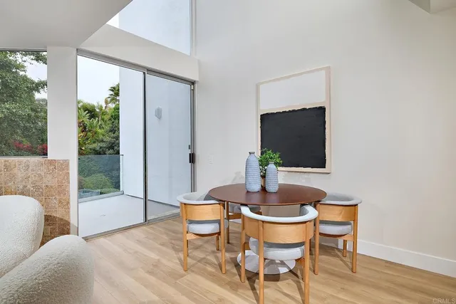 a kitchen with stainless steel appliances a stove a sink and a microwave