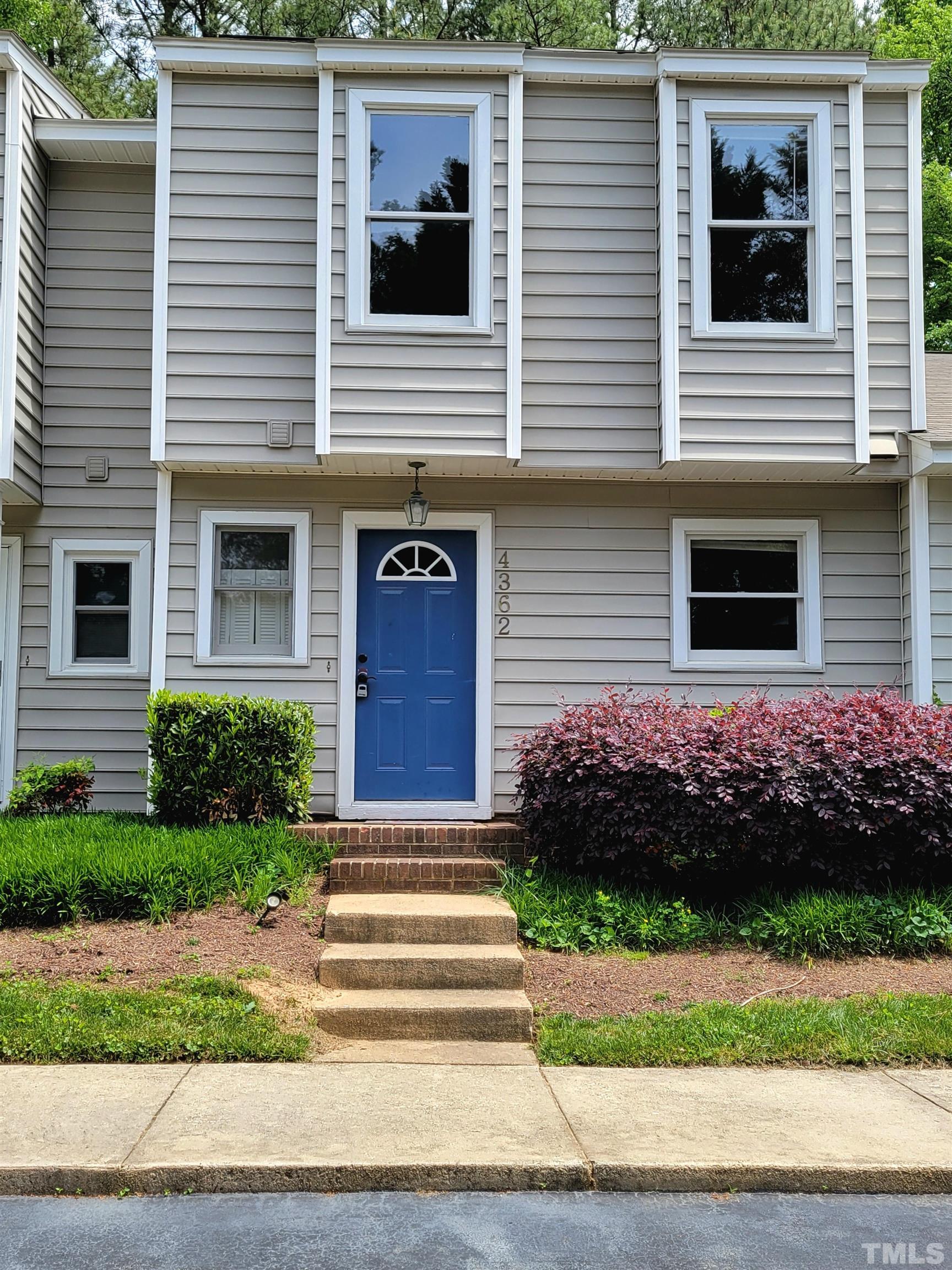 4362 Bona Court Raleigh, NC 27604 - Photo 1 of 17 a front view of a house with a yard
