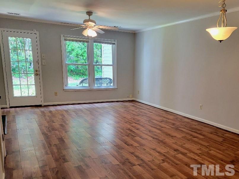 4362 Bona Court Raleigh, NC 27604 - Photo 2 of 17 wooden floor in an empty room with a window