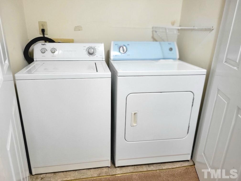 4362 Bona Court Raleigh, NC 27604 - Photo 7 of 17 a utility room with dryer and washer