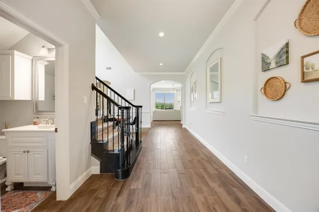 a view of entryway with wooden floor