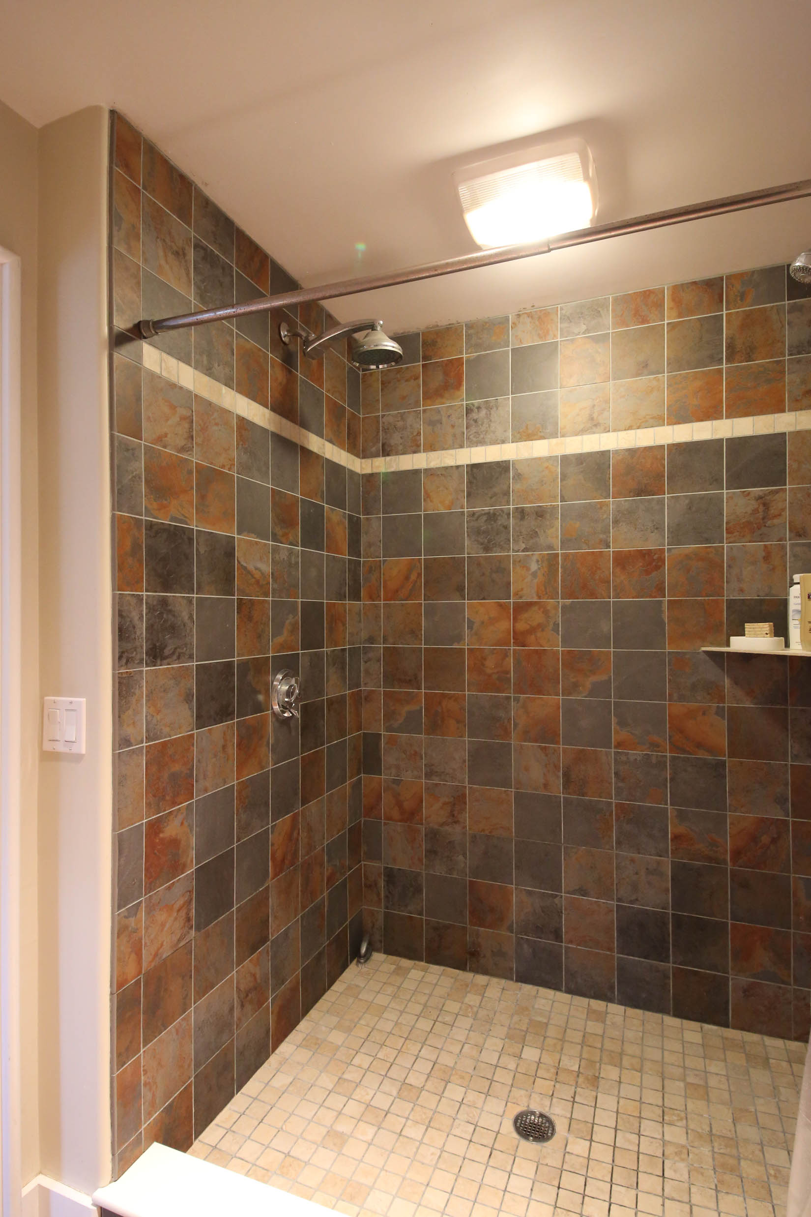 65 B Fairgrounds Road, Unit 2 Nantucket, MA 02554 - Photo 14 of 24 Large, tiled first floor shower.