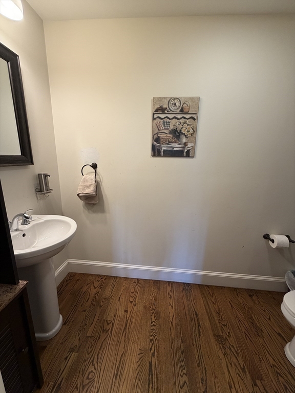 17 Cardinal Street, Unit 17 Winchester, MA 01890 - Photo 4 of 42 a bathroom with a sink and a toilet