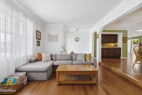 a living room with furniture and a window