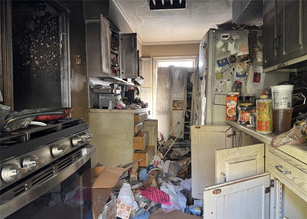 3654 Fontana Drive Dallas, TX 75220 - Photo 4 of 6 Fire damaged kitchen