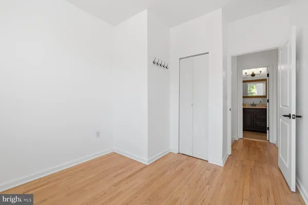 a view of an empty room with stairs