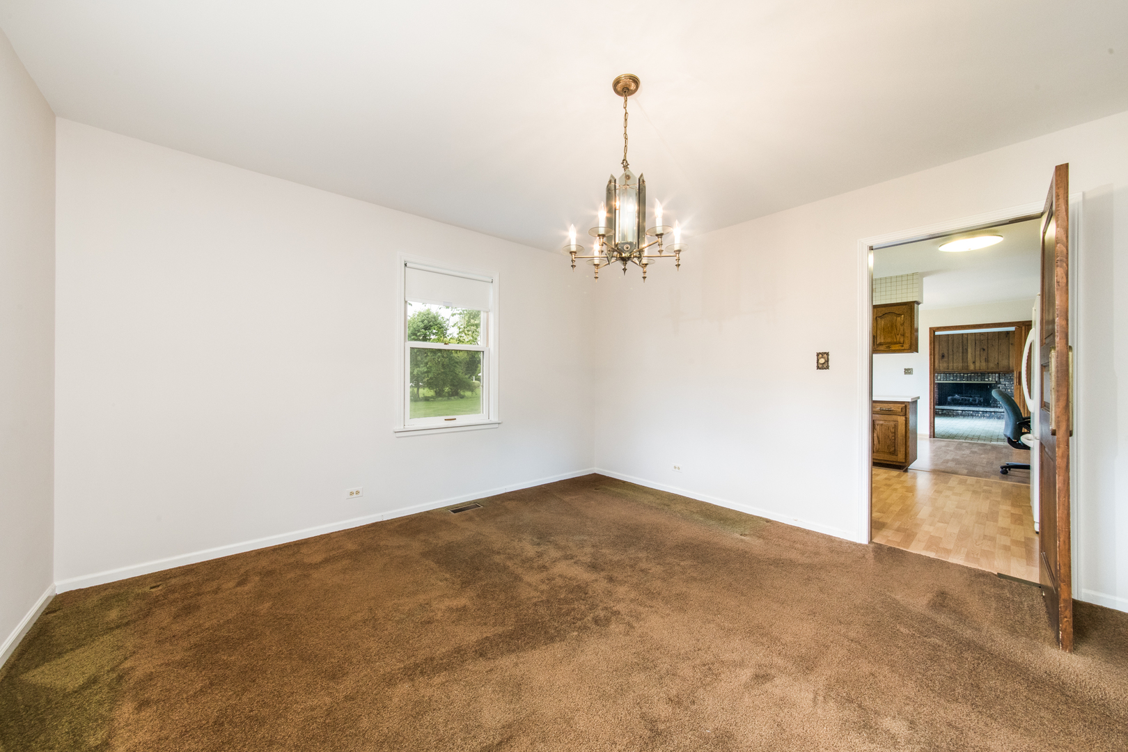 1701 Banbury Road Inverness, IL 60067 - Photo 11 of 33 a view of empty room with window