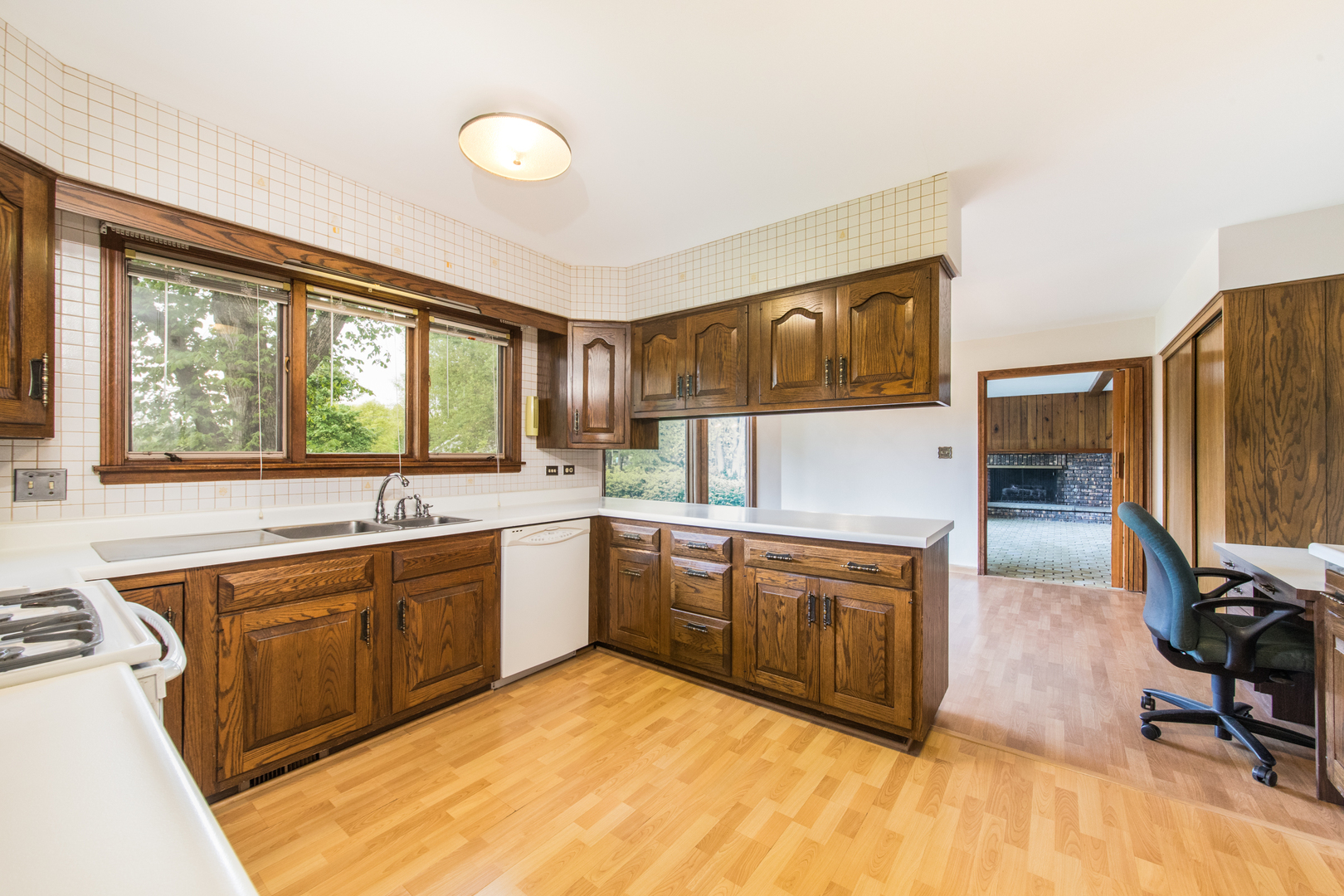 1701 Banbury Road Inverness, IL 60067 - Photo 12 of 33 a large kitchen with stainless steel appliances granite countertop a sink and cabinets