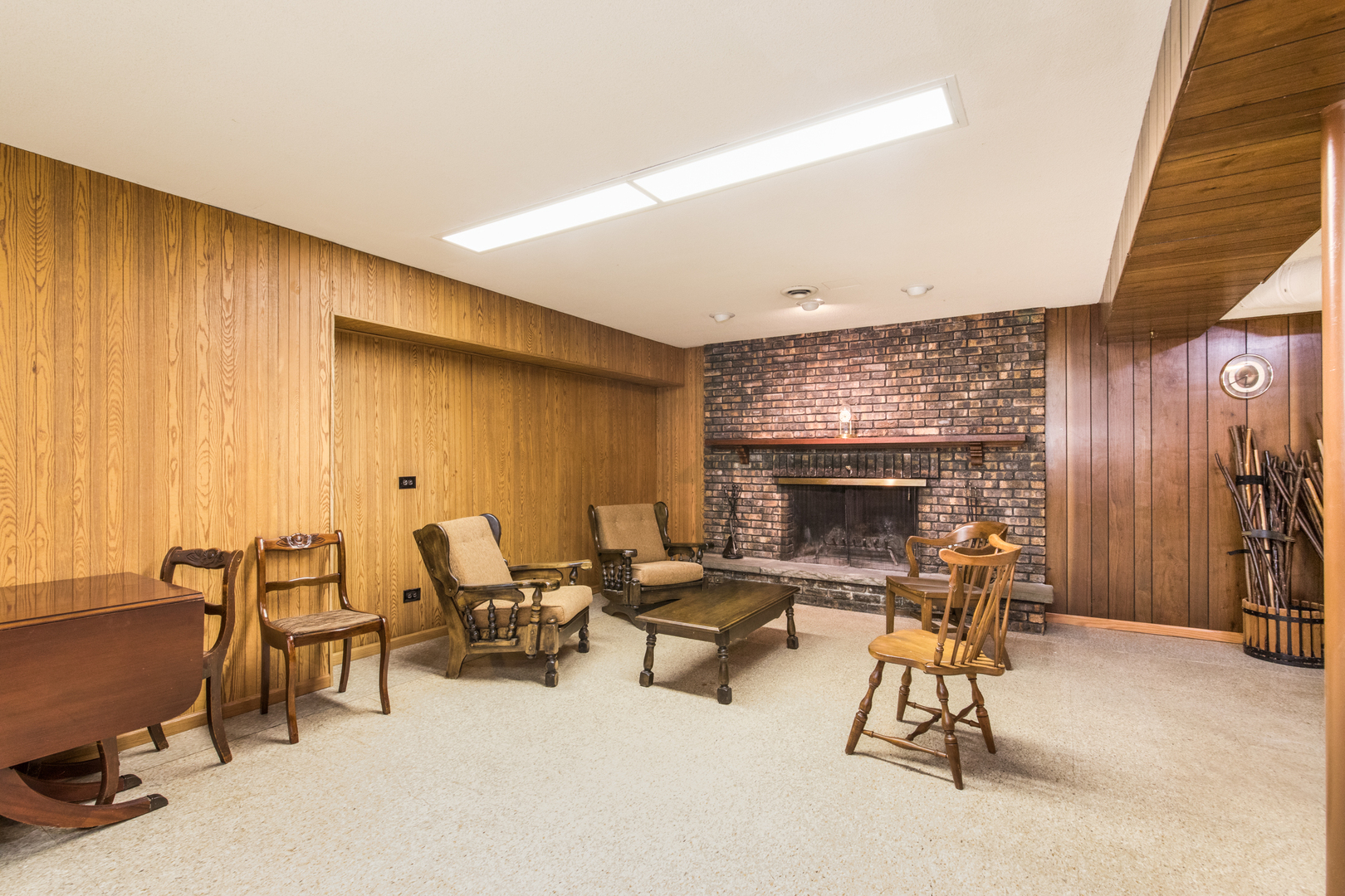 1701 Banbury Road Inverness, IL 60067 - Photo 28 of 33 a living room with furniture and a fireplace