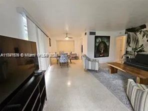 a lobby with furniture and rug