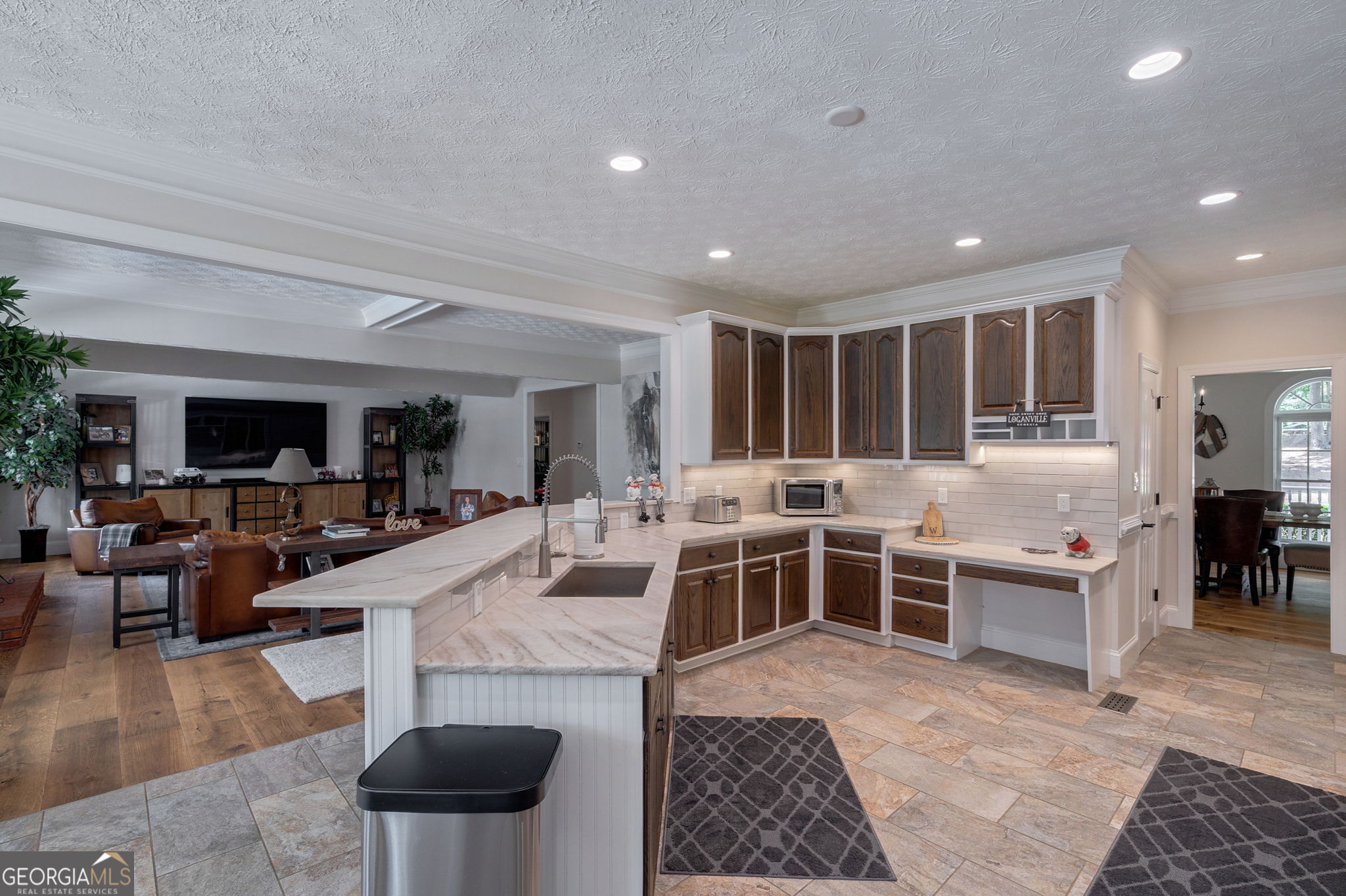 2391 Rabbit Farm Circle Loganville, GA 30052 - Photo 26 of 97 a living room with lots of furniture and view of kitchen