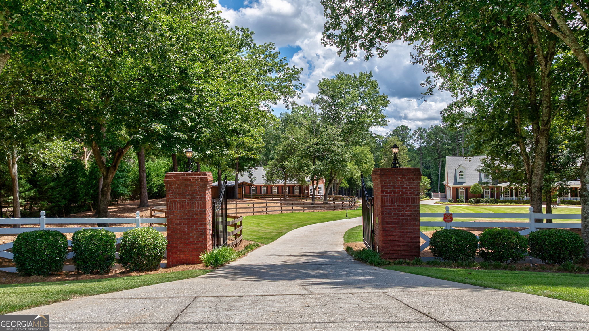 2391 Rabbit Farm Circle Loganville, GA 30052 - Photo 3 of 97 a view of a park with plants and trees