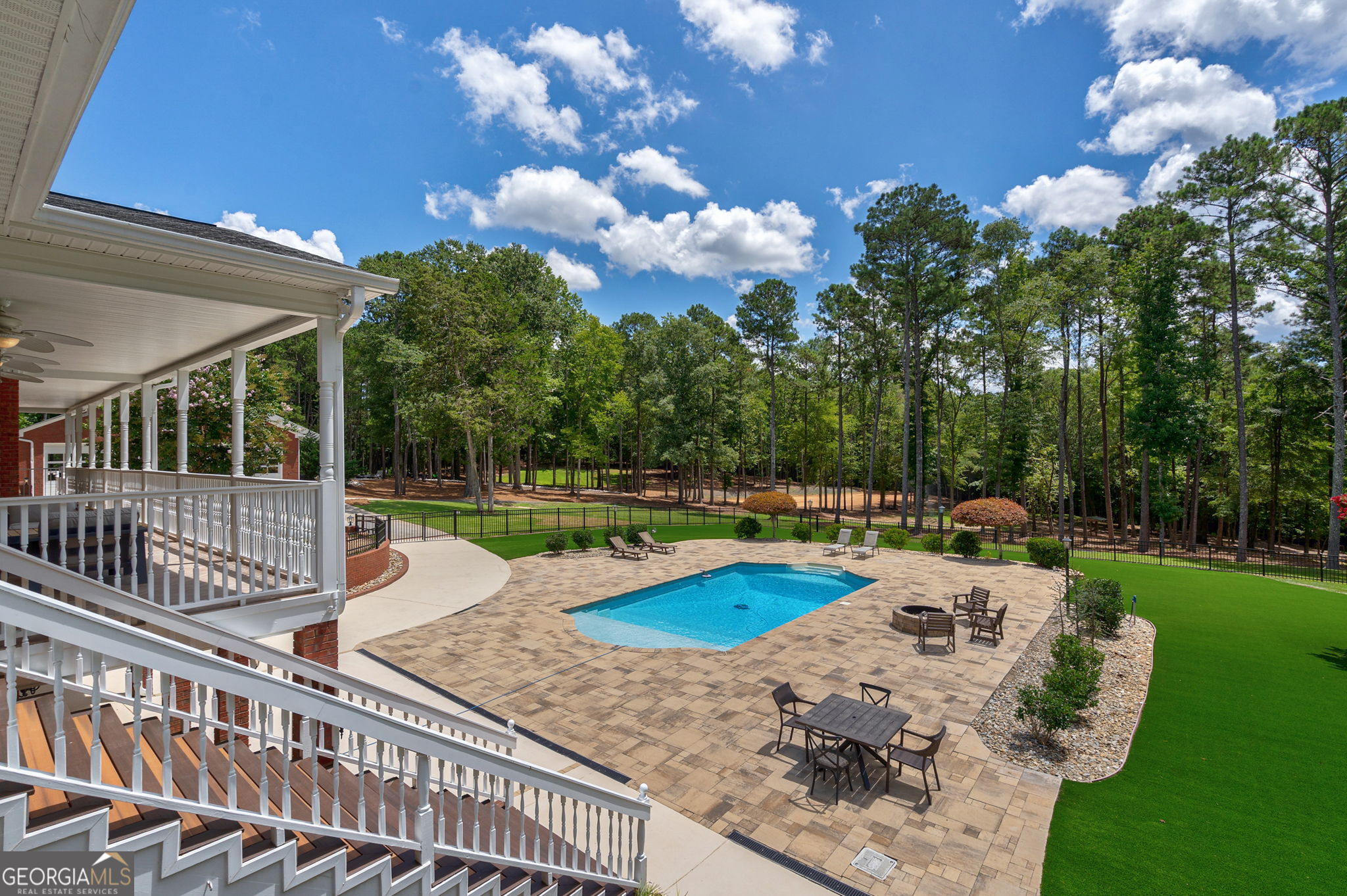 2391 Rabbit Farm Circle Loganville, GA 30052 - Photo 41 of 97 a view of a swimming pool and lounge chair