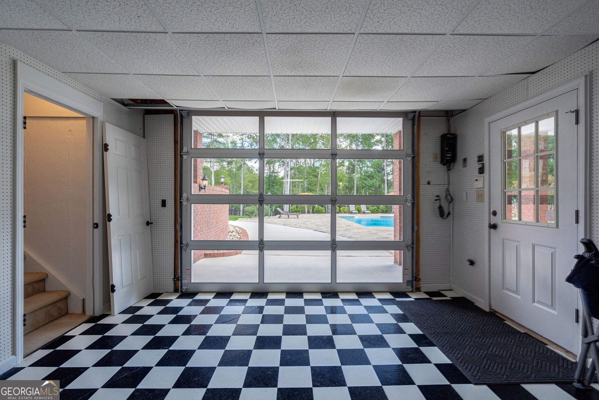 2391 Rabbit Farm Circle Loganville, GA 30052 - Photo 65 of 97 a view of a big room with wooden floor and windows