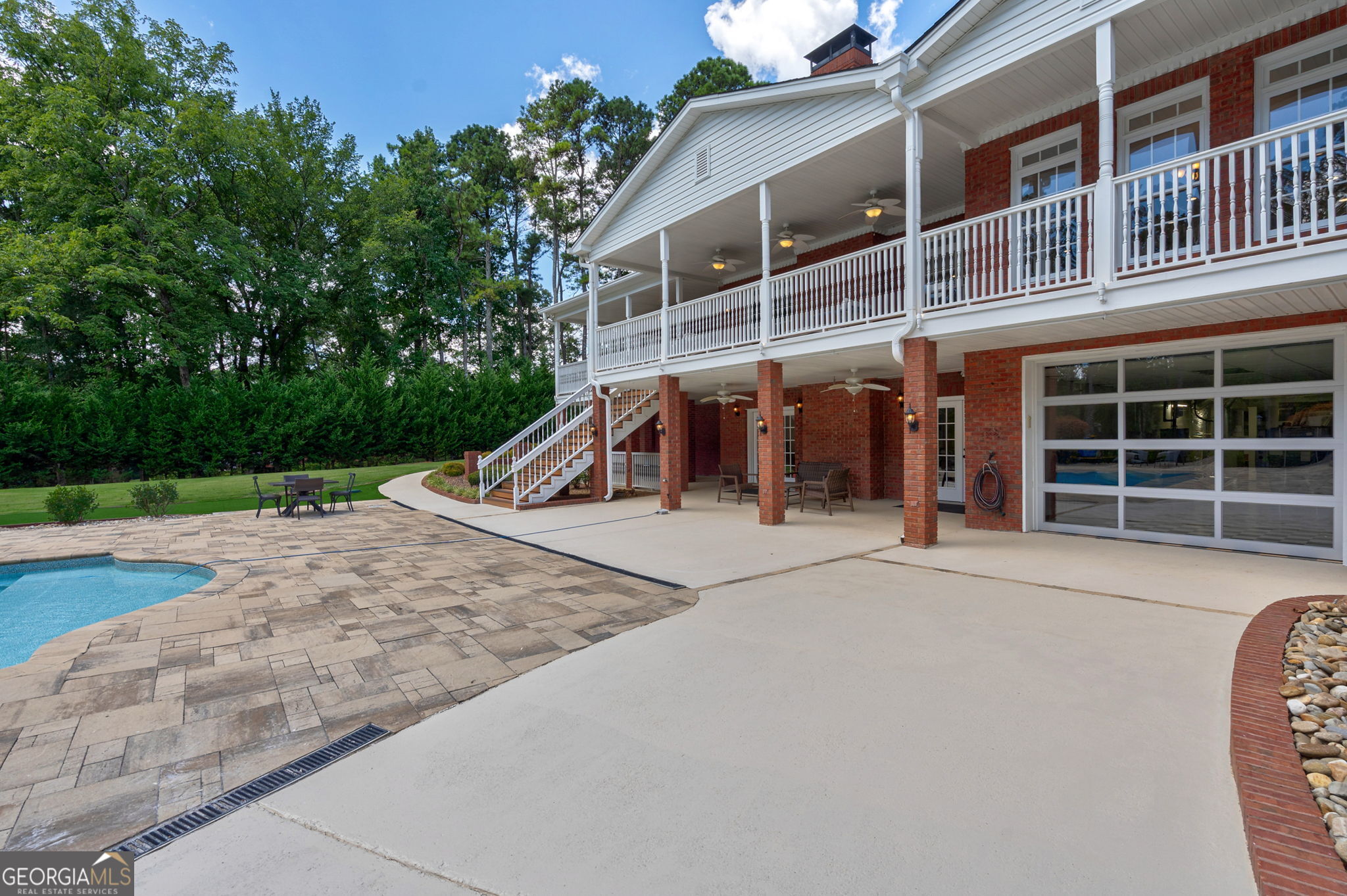 2391 Rabbit Farm Circle Loganville, GA 30052 - Photo 66 of 97 a view of a house with a backyard and porch