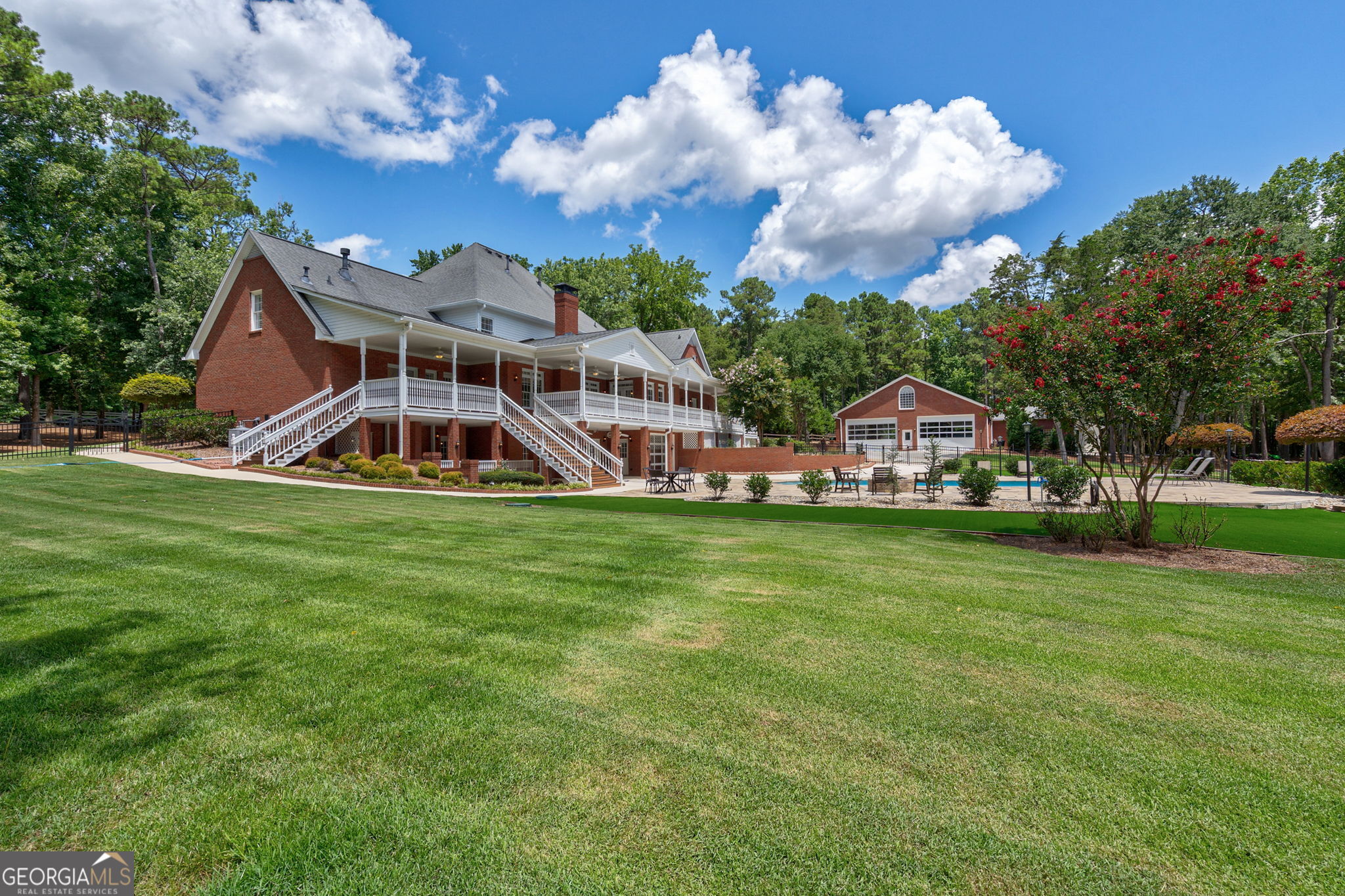 2391 Rabbit Farm Circle Loganville, GA 30052 - Photo 70 of 97 a front view of a house with garden
