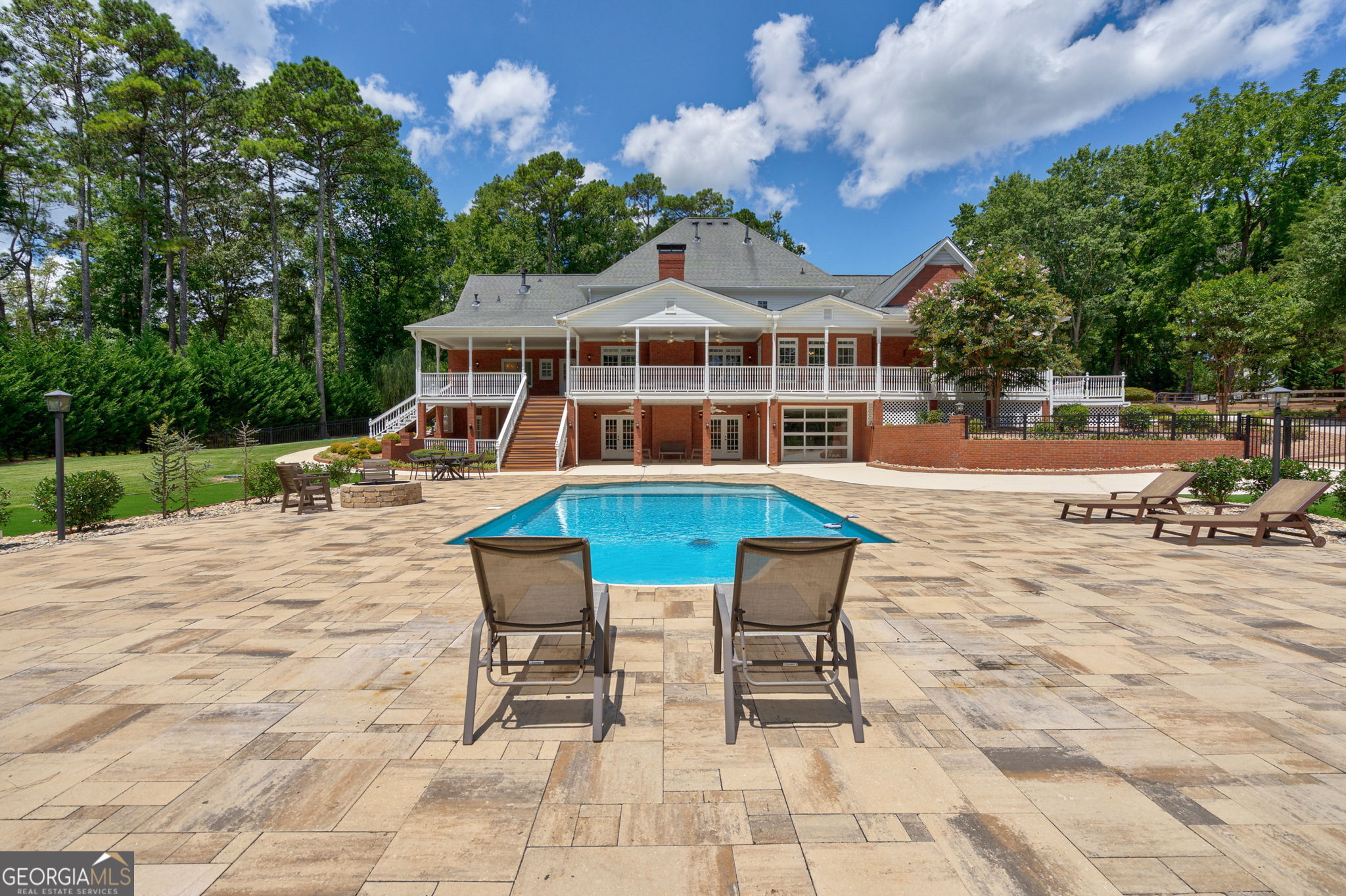 2391 Rabbit Farm Circle Loganville, GA 30052 - Photo 88 of 97 a view of a house with swimming pool and sitting area