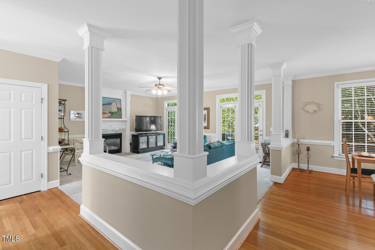 7930 Pine Timber Drive Raleigh, NC 27613 - Photo 16 of 57 a living room with large window and furniture
